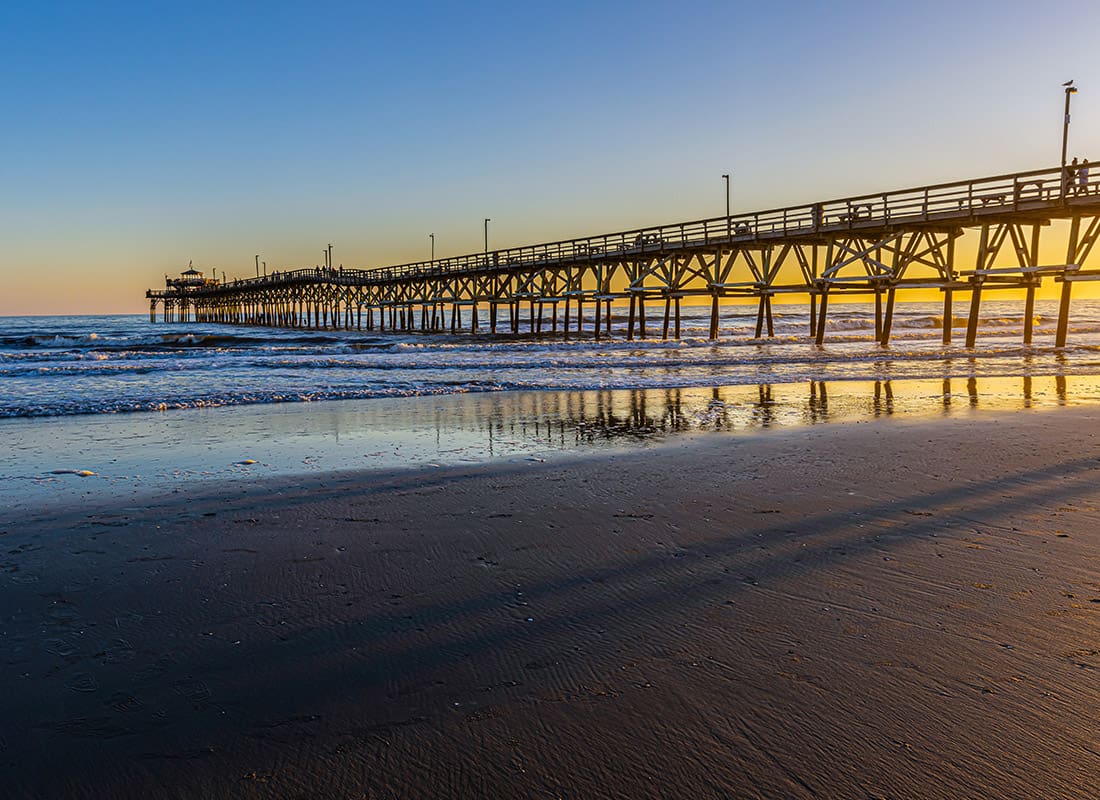 Insurance Solutions - Long Pier by the Shore During Sunrise